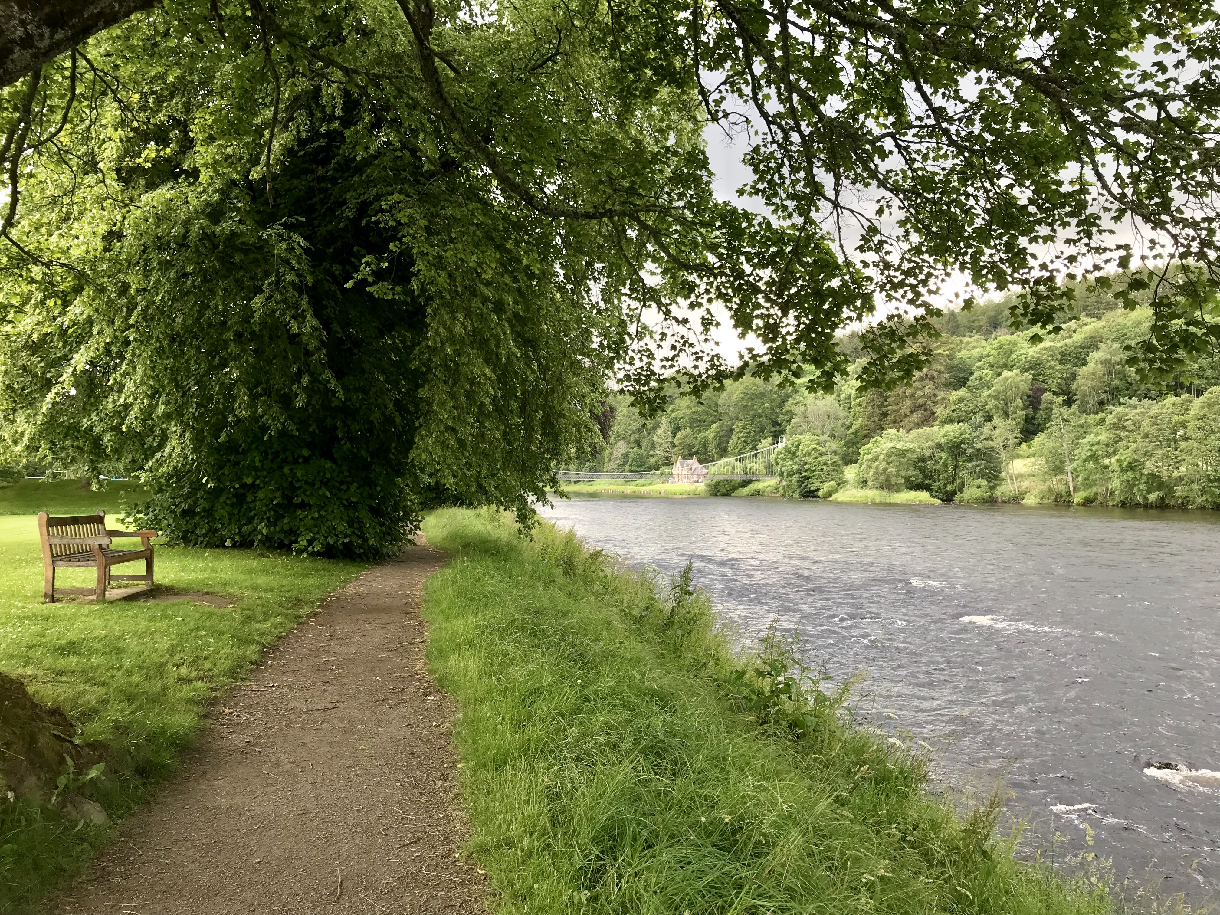 Walking along the River Spey, our bellies full of scotch.